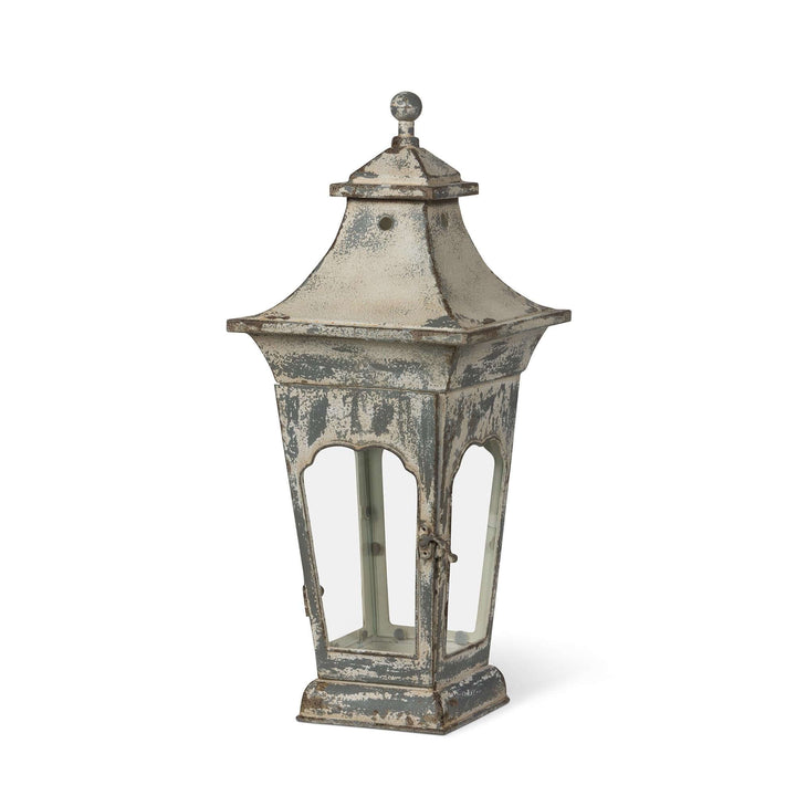 Vespera Iron Lantern, small: angled view showing the distressed finish, flared roof and scalloped window frames