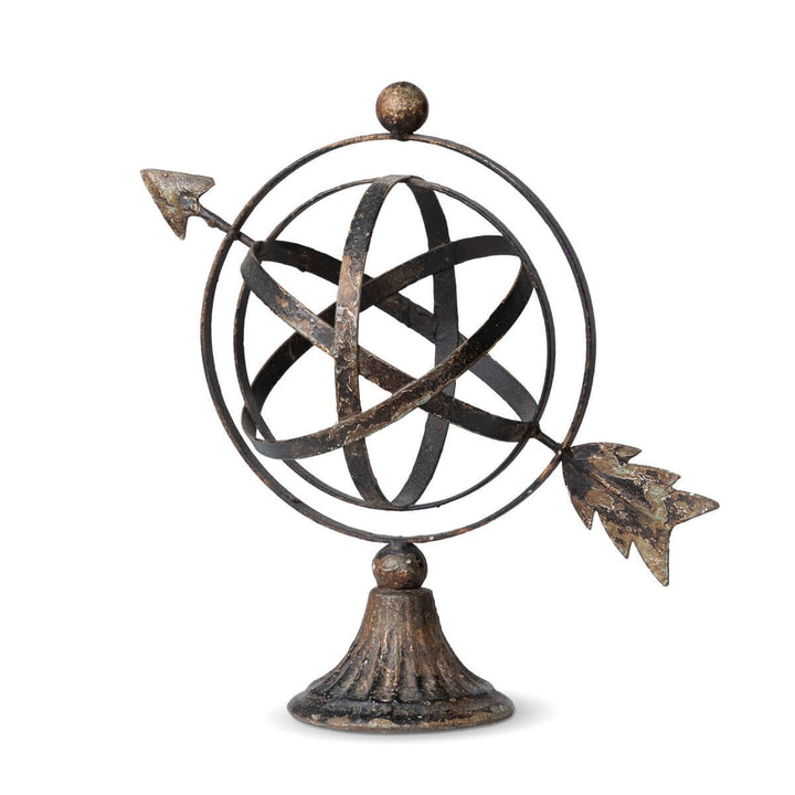 Vintage armillary iron sculpture with arrow, historical decor piece echoing ancient astronomy, ideal for home or office.