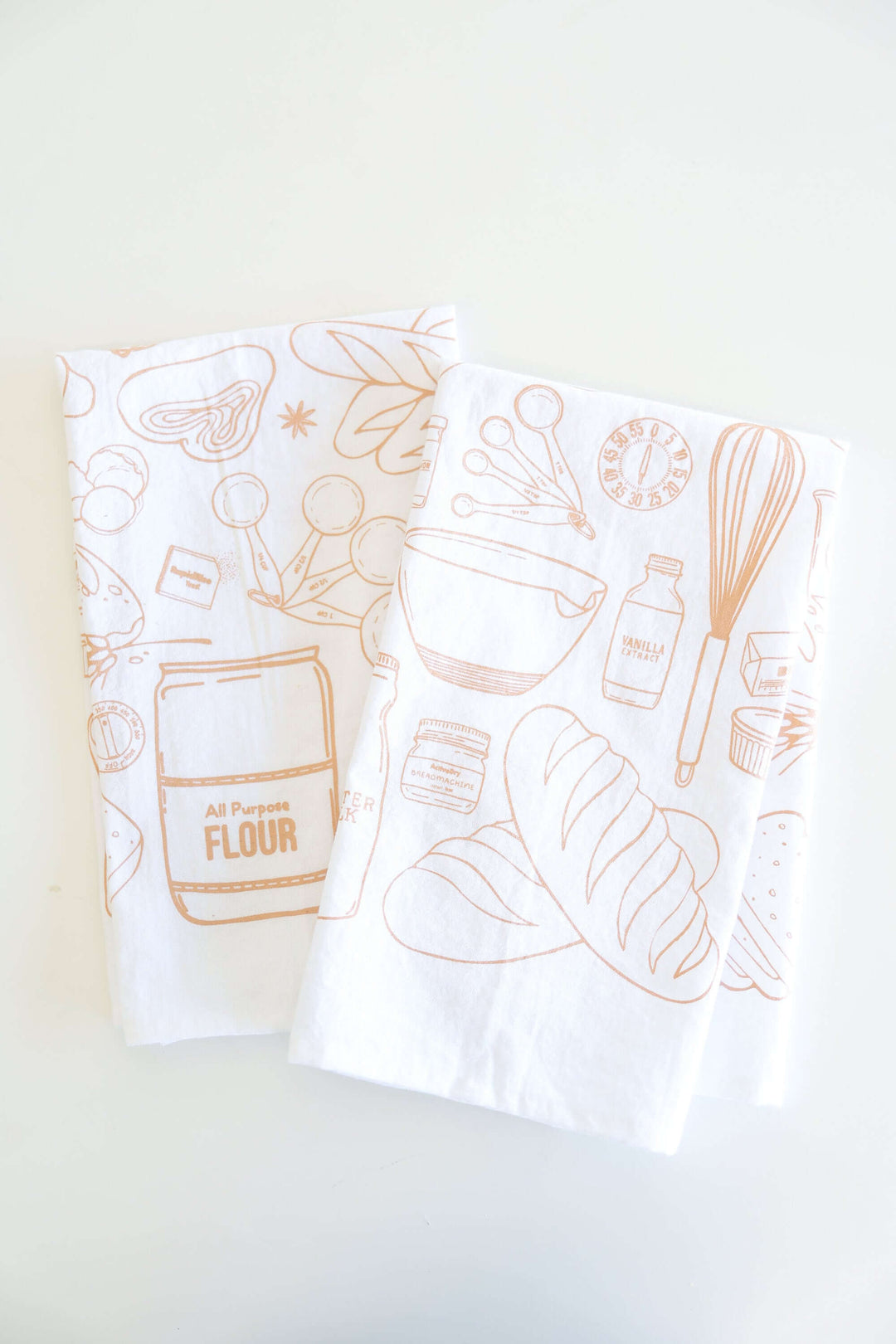Vintage Bread Baking Tea Towel with hand-drawn bread and baking illustrations, perfect for capturing the essence of home baking.