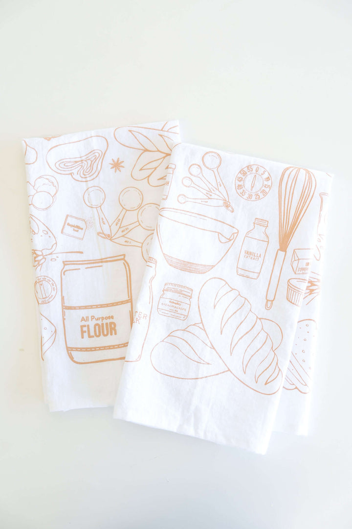 Vintage Bread Baking Tea Towel with hand-drawn bread and baking illustrations, perfect for capturing the essence of home baking.