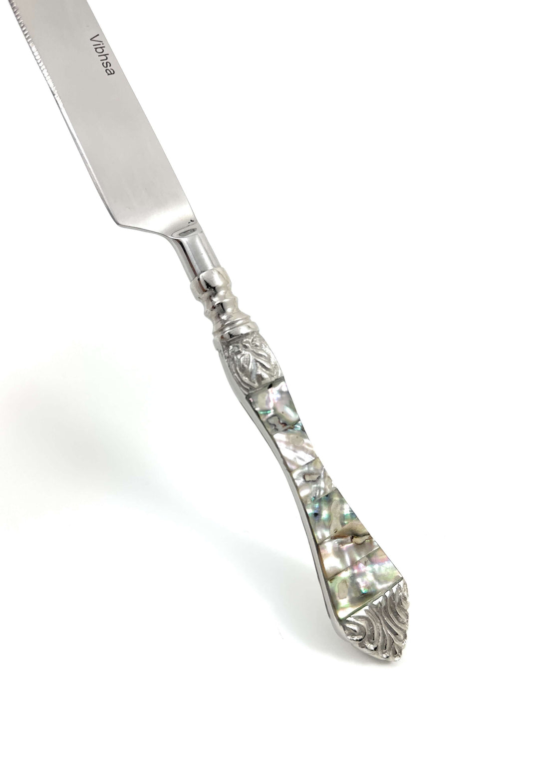 Knife from Vintage Coastal Flatware Set with Abalone Inlay Handles (Set of 20) showcasing iridescent abalone detail.