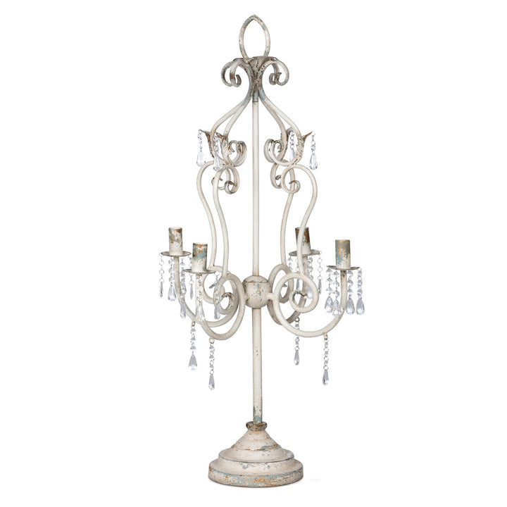 Vintage tabletop chandelier with crystals and distressed finish, adding romantic elegance and antique charm to any room.