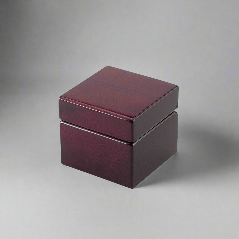 Closed rosewood box containing Vintage Desk Clock and Compass.