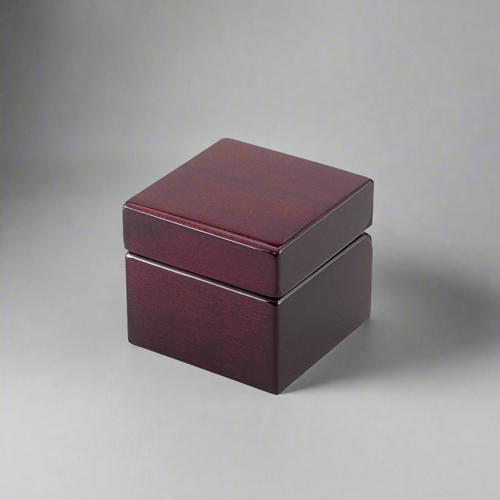 Closed rosewood box containing Vintage Desk Clock and Compass.