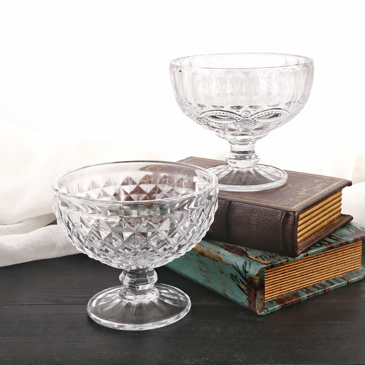 Vintage embossed glass pedestal dessert cup filled with fresh strawberries