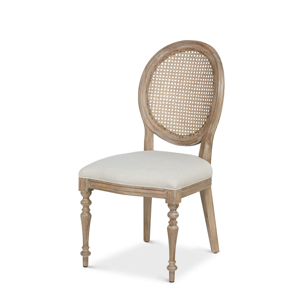 Vintage Farmhouse Cane Back Dining Chair with linen upholstery and hand-carved wood, inspired by Cotswold craft.