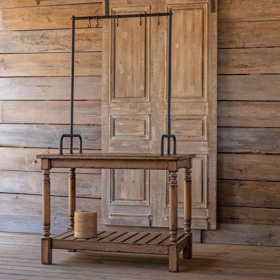Vintage French Patisserie Kitchen Island with rustic wood finish and elegant design evokes old Parisian bakery charm.