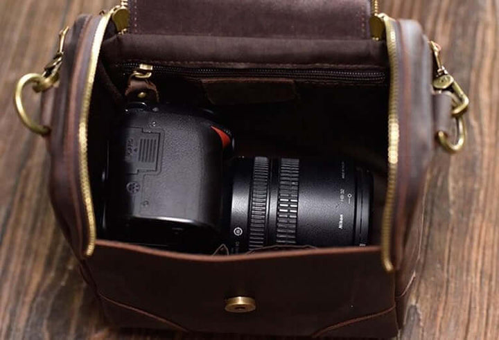 Open Vintage Full-Grain Leather Camera Bag showcasing interior with camera inside.