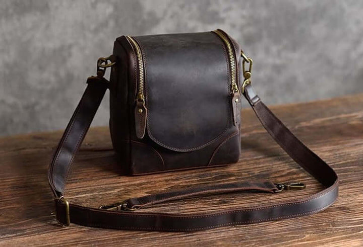Vintage Full-Grain Leather Camera Bag on a wooden table