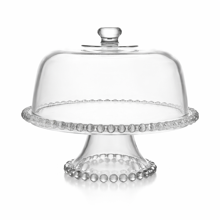 Close view of the domed cover, knob, and decorative glass pedestal