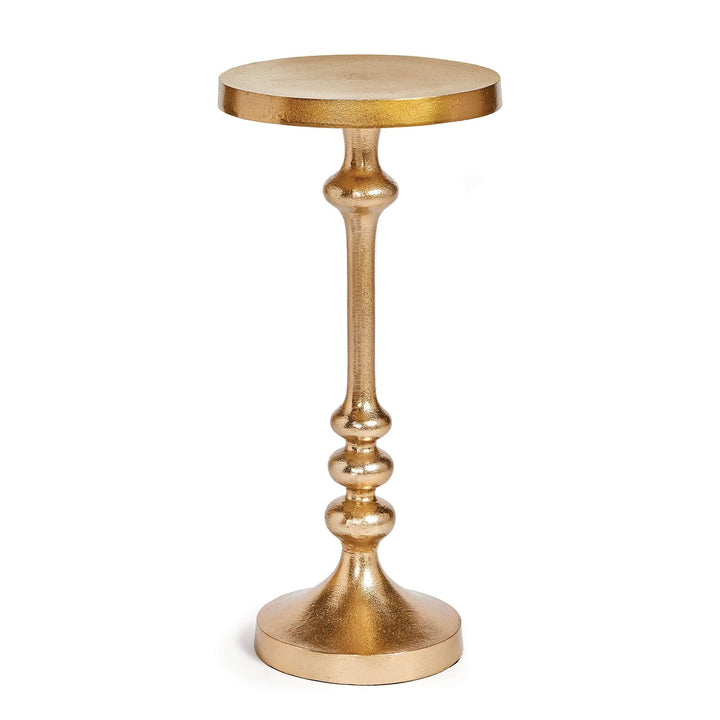 Vintage gold accent table with pedestal base, showcasing a glamorous design and elegant silhouette.