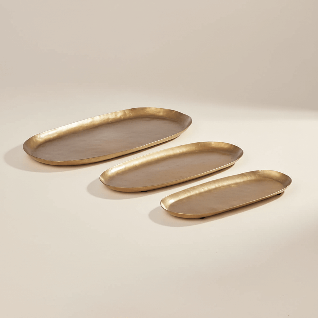 Vintage Gold Iron Serving Tray Set - Hand-hammered oval trays in antique gold finish for elegant entertaining, set of three trays