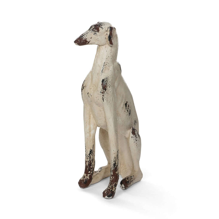 Vintage Greyhound Dog Statue with distressed finish resembling weathered cast iron, crafted from magnesium oxide, 31 inches tall.