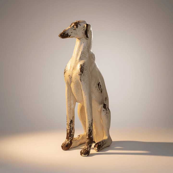 Statue of a dog on a plain background