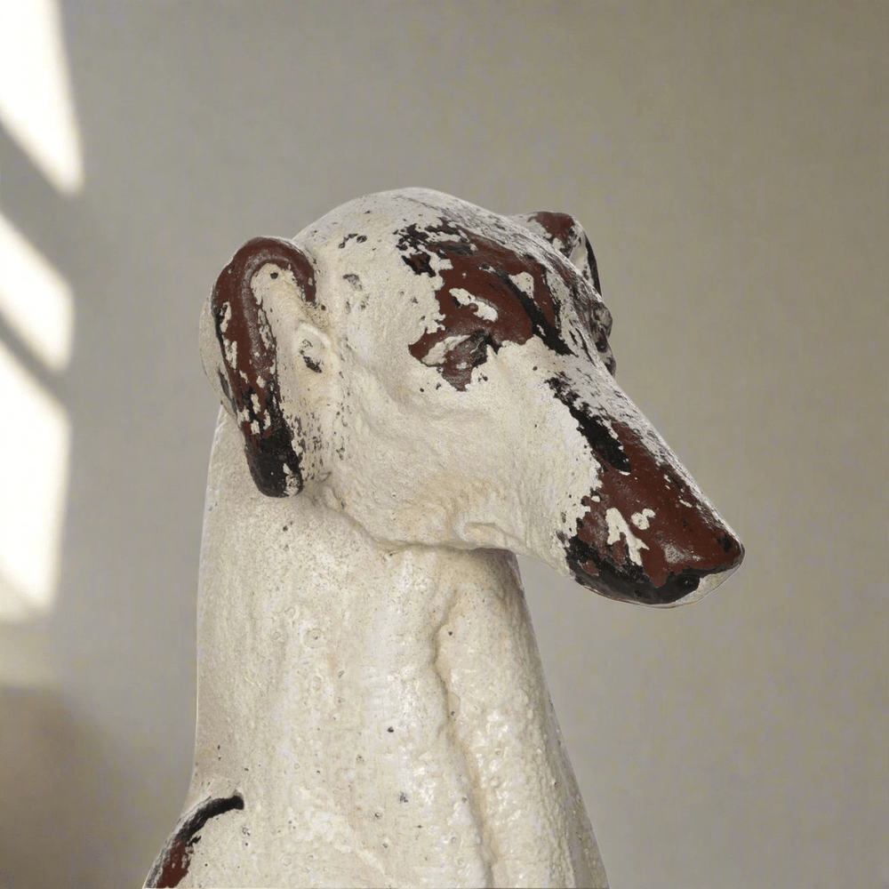 Close-up of Vintage Greyhound Dog Statue with distressed surface, capturing the elegance of the breed, crafted from magnesium oxide.