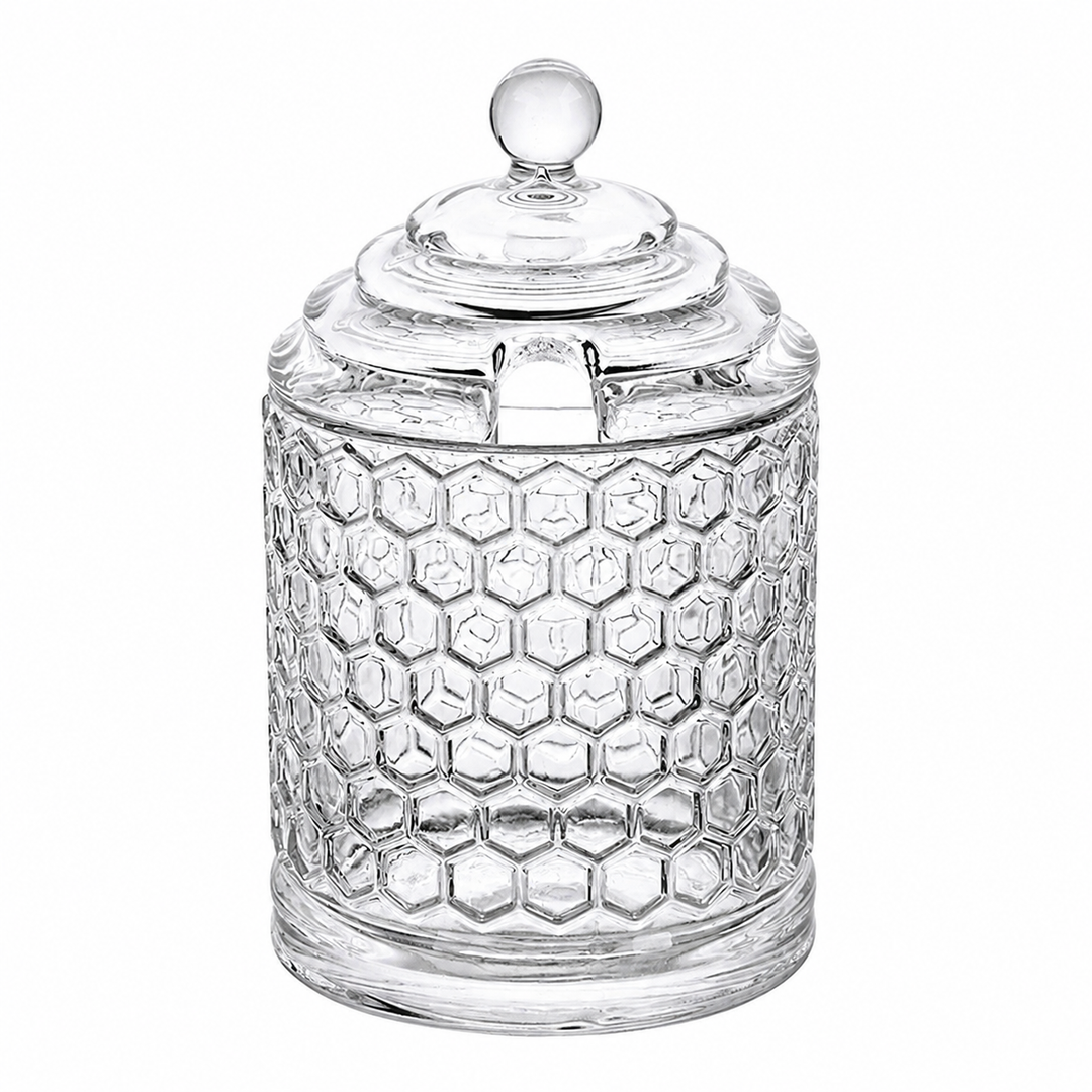 Vintage-inspired honeycomb glass storage jar photographed on a clean background