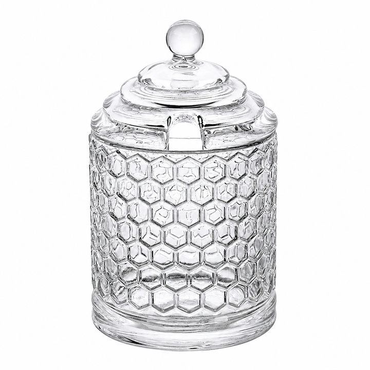 Vintage-inspired honeycomb glass storage jar photographed on a clean background
