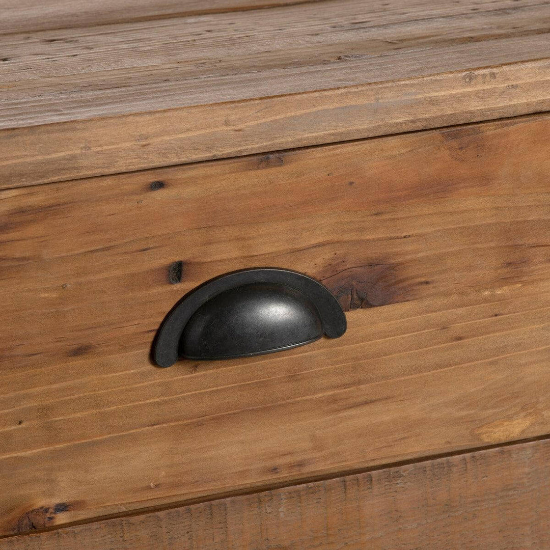 Close-up of drawer detail with black metal handle on Vintage Industrial Factory Cart Island.