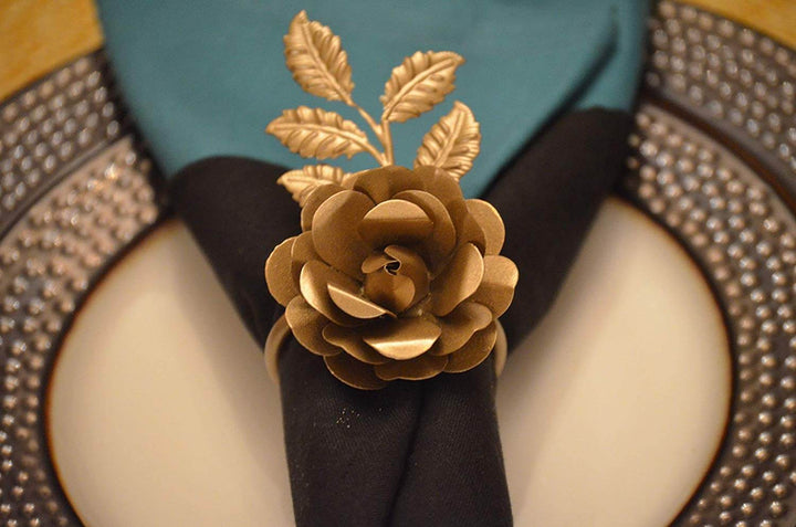 Vintage-Inspired Floral Golden Rose Napkin Rings (Set of 4) on elegant table setting.