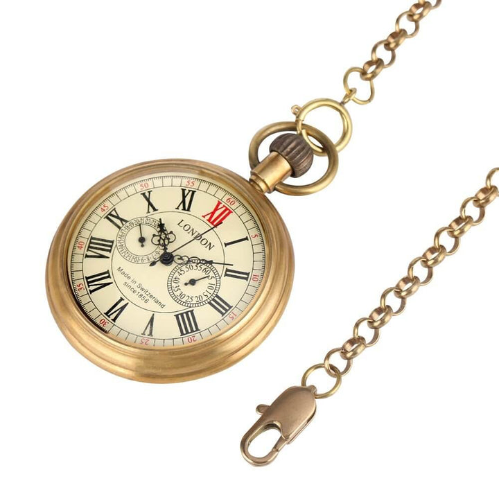 Vintage London Mechanical Pocket Watch with Roman numerals on brass case and classic chain.