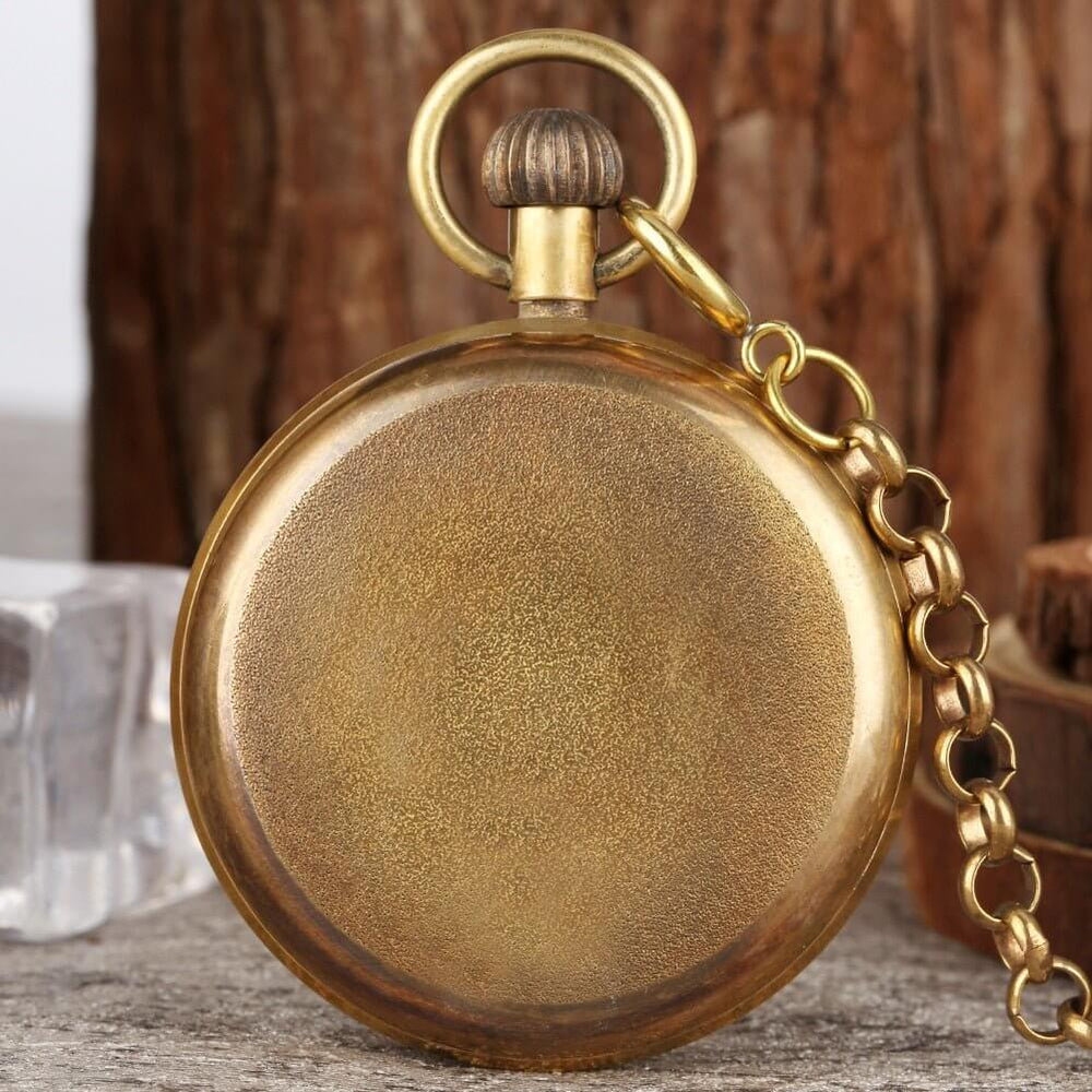 Vintage London Mechanical Pocket Watch with brass finish and chain, showcasing antique charm and elegance.