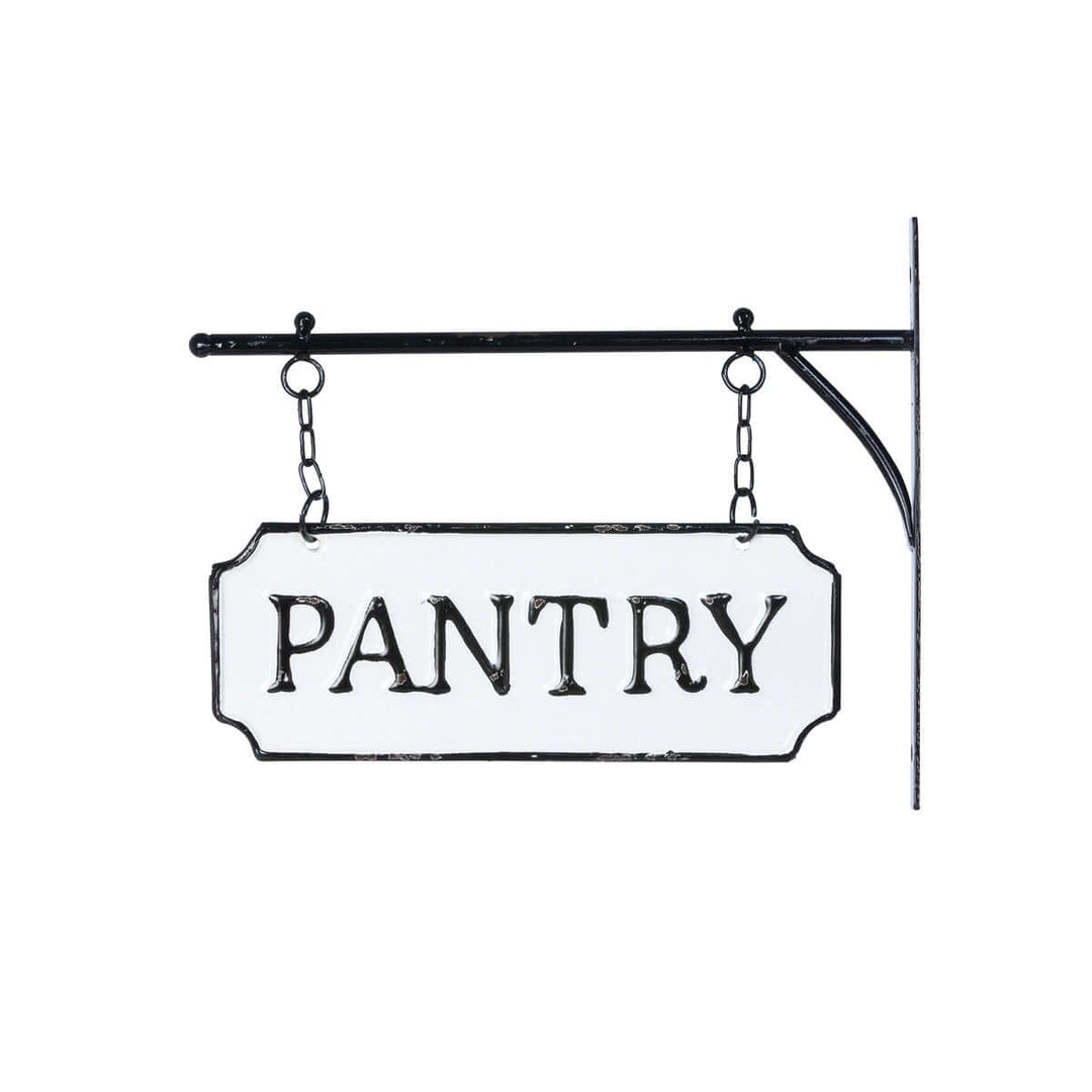 Vintage metal pantry sign with black-and-white enamel finish and hanging display bar, evoking old country kitchen nostalgia.
