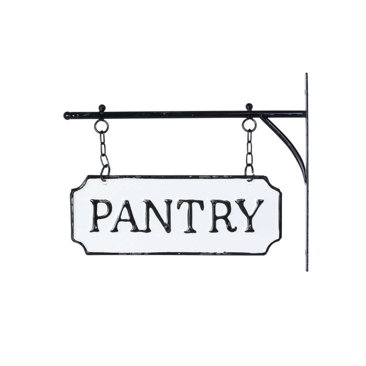 Vintage metal pantry sign with black-and-white enamel finish and hanging display bar, evoking old country kitchen nostalgia.