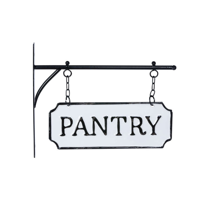 Vintage metal pantry sign with black-and-white enamel finish, featuring a hanging display bar for a nostalgic kitchen decor touch.