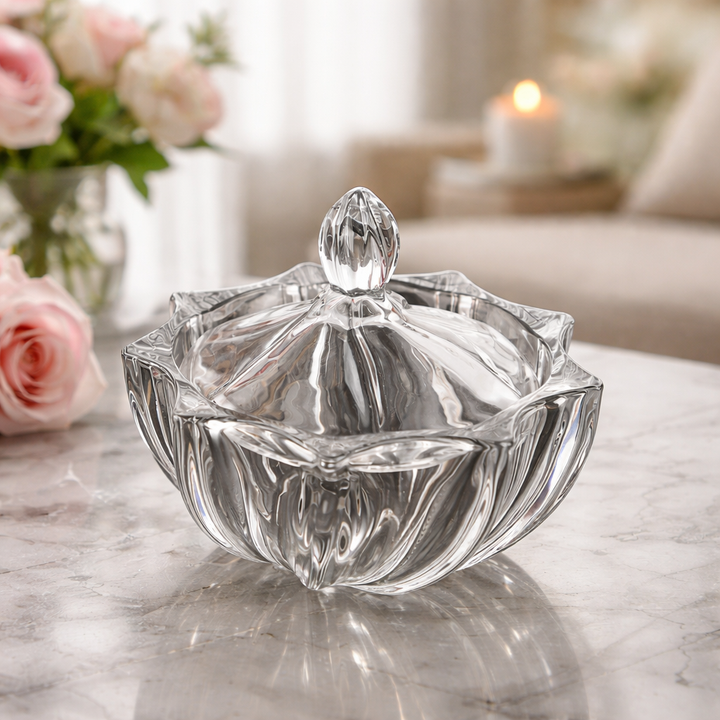 Petal-cut glass candy jar displayed in a softly lit romantic interior