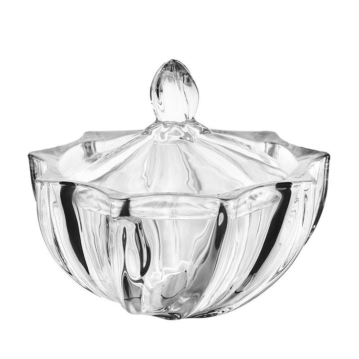 Vintage-inspired petal glass candy jar photographed on a light background
