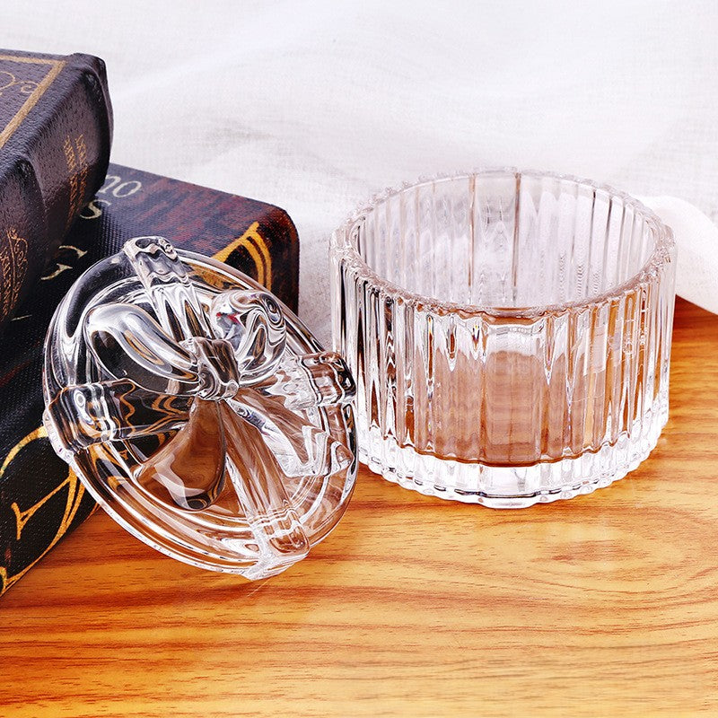 Vintage-inspired ribbed glass sugar bowl photographed on a light background