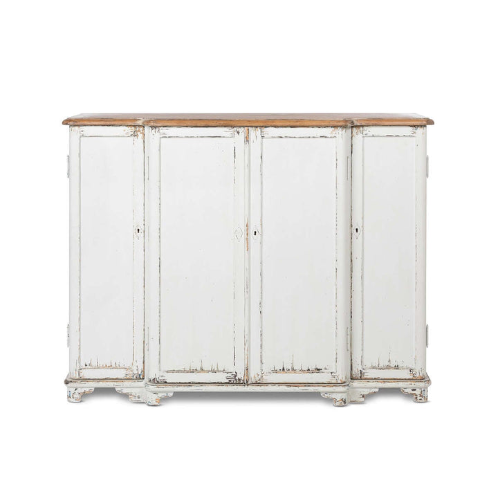 Vintage white painted entryway cabinet with distressed wood top and aged finish, evoking a cozy country cottage feel.