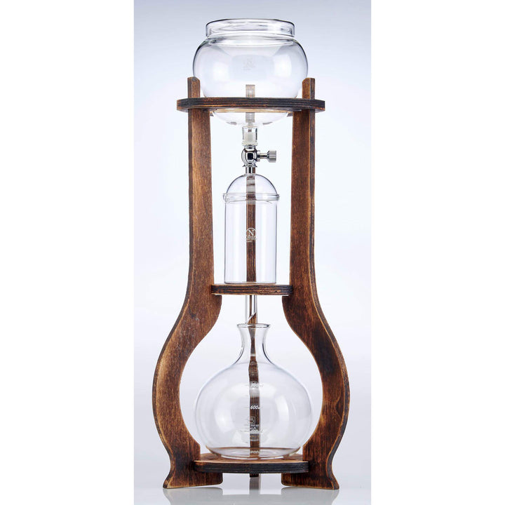 Vintage Wooden Cold Brew Coffee Maker Tower with glass vessels and wooden frame on display against white background.