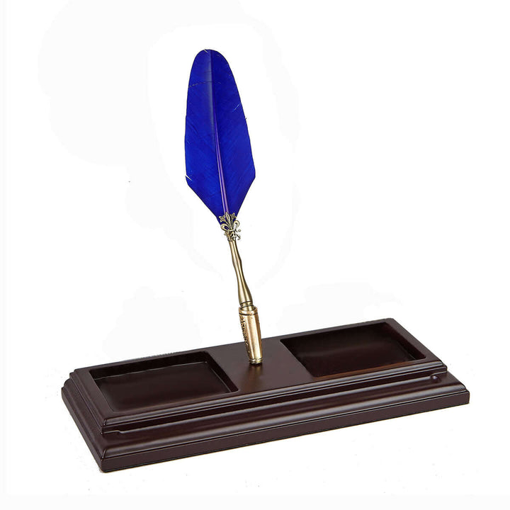 Vintage Wooden Desk Organizer with Feather Quill Pen Set on a mahogany base.