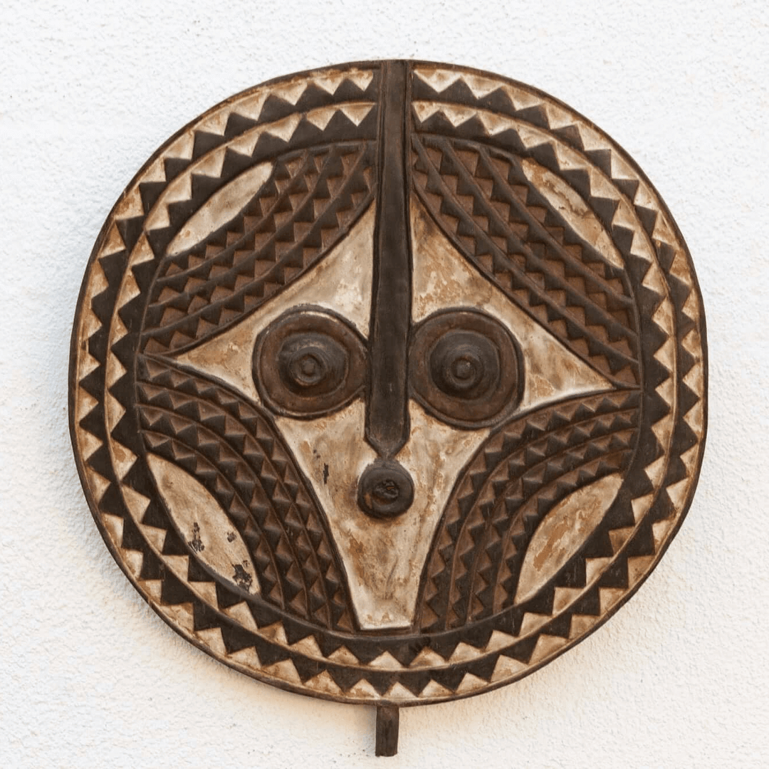 Vintage Bobo African Sun Mask from Burkina Faso, hand-carved wooden sun mask with white and earthen tones.