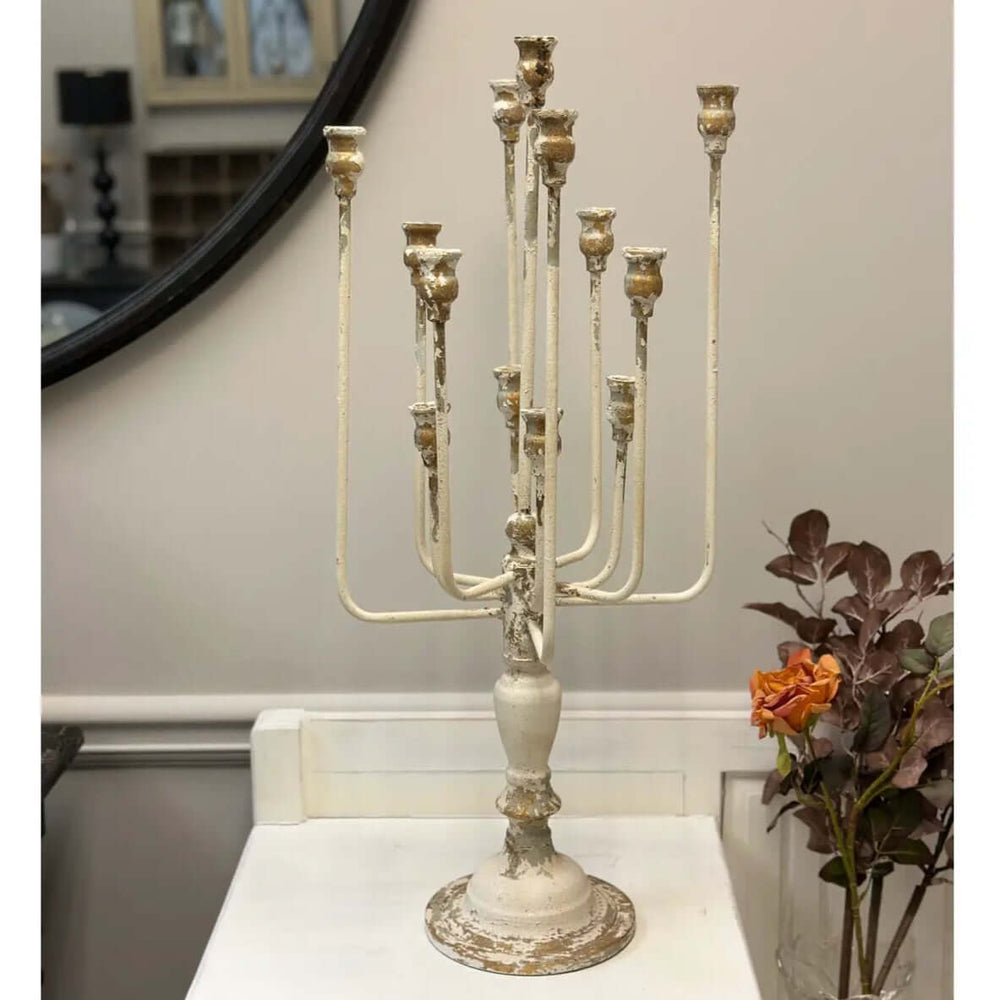 Vintage Farmhouse Candelabra in Distressed White Iron on display