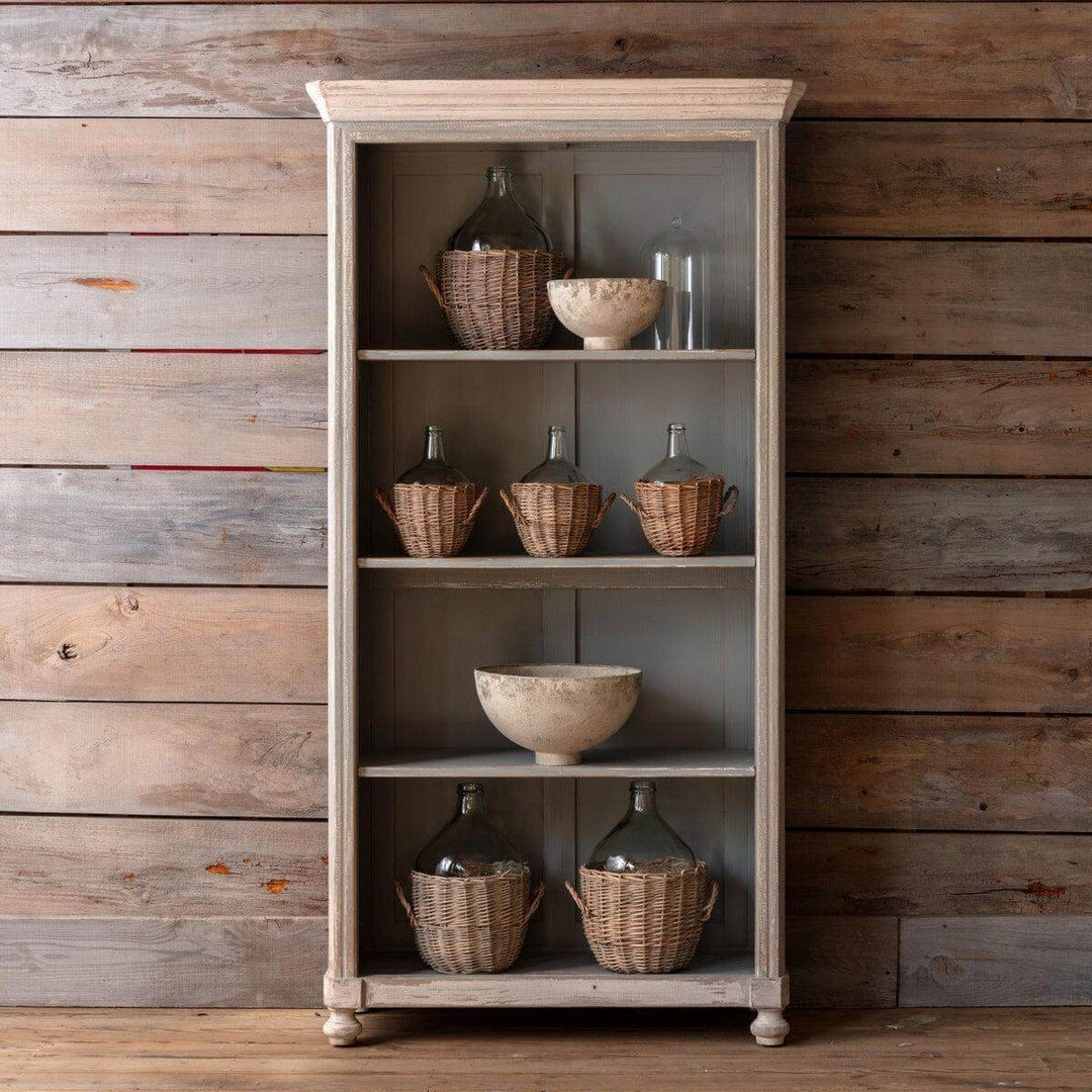 Vintage French Country Painted Wood Cabinet with a distressed finish, showcasing rustic charm against a wooden backdrop.