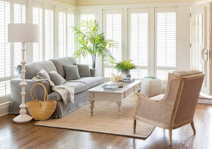 Alt Tag: Modern living room featuring a Vintage French Country Whitewashed Coffee Table With Drawers and classic decor accents.