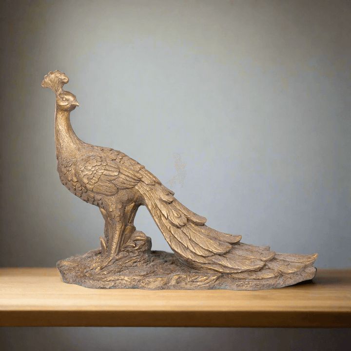 Vintage Gilded Peacock Statue with elegant design and luxurious gilded patina, symbolizing timeless beauty and grace.