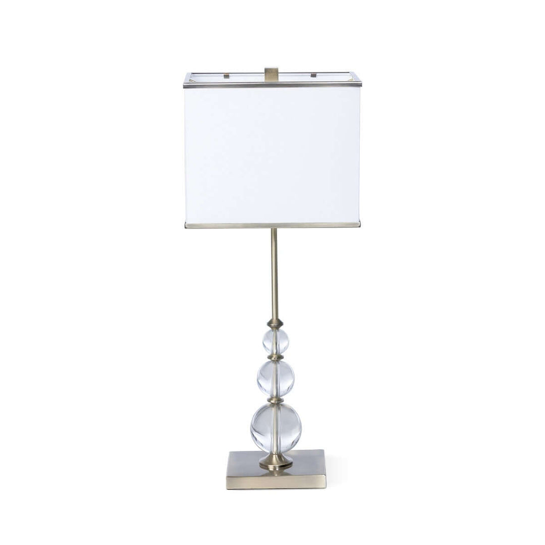 Buffet Lamp with Crystal Orbs and Brass Base showcasing vintage glamour with its elegant design and refined Hollywood-inspired charm.