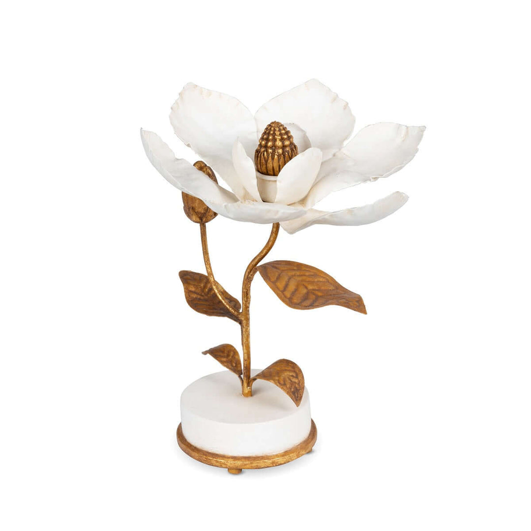 Vintage Gold Magnolia Candle Holder with white petals and golden accents on a smooth white base.