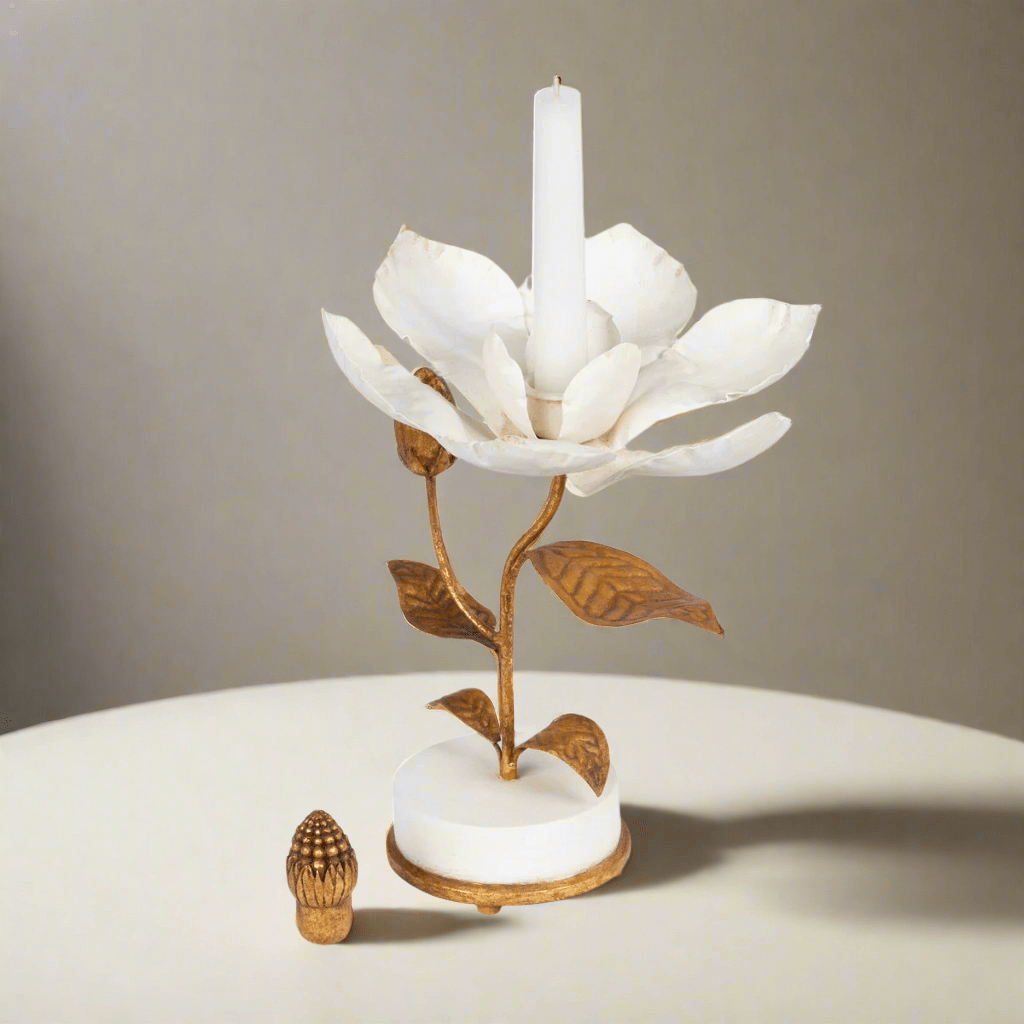 Vintage Gold Magnolia Candle Holder with white petals and golden center, hand sculpted from gilded metal on a smooth white base