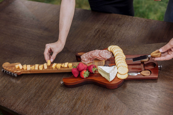 Vintage Guitar-Shaped Cheese Board with Hidden Drawer and Tools, featuring cheese, crackers, and strawberries on an acacia wood board.
