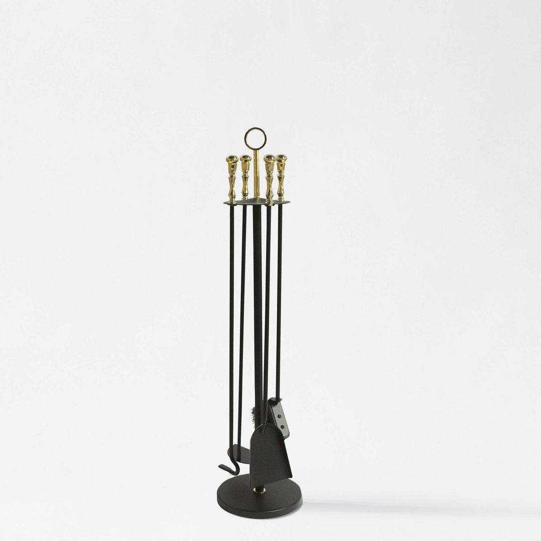 Vintage Italian Fireplace Tool Set with Brass Handles displayed on a stand.