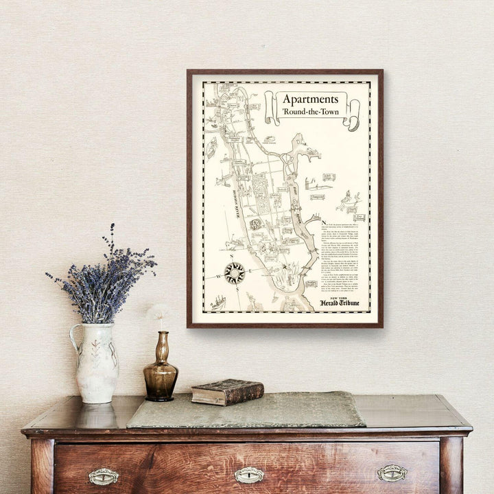 Vintage Map of Manhattan 1935 hanging on a wall above a wooden table with decor items.