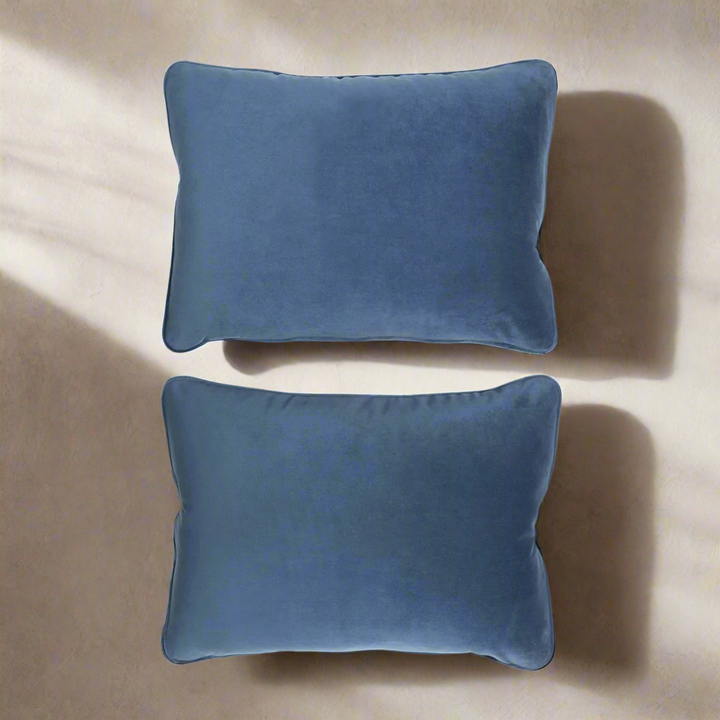 Vintage Velvet Throw Pillows in Atlantic Blue (Set of 2) display rich jewel tones and soft textures on a neutral background.