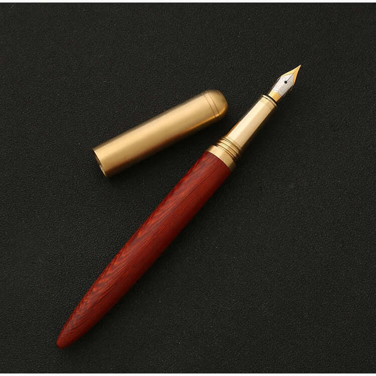 Vintage Wood and Brass Fountain Pen | The Hemmingway - elegant brass and wood pen with cap on black background