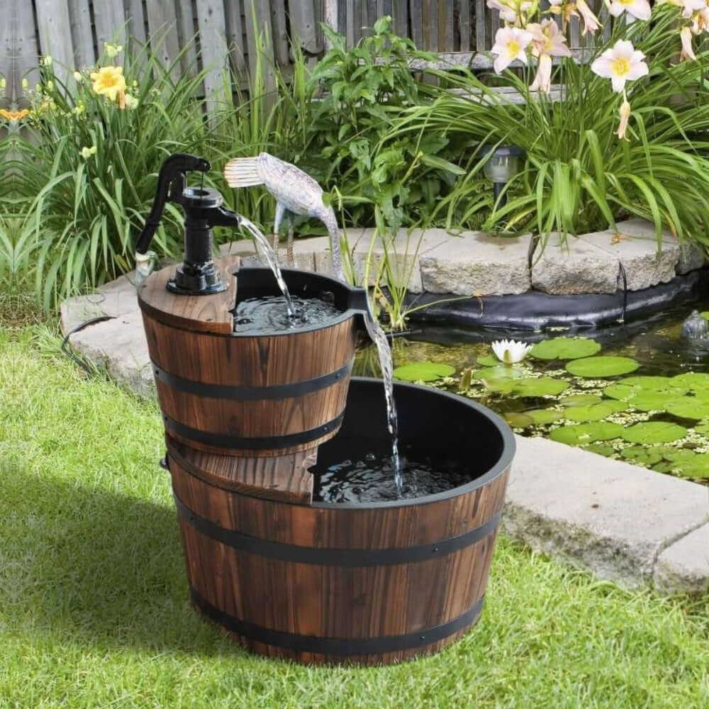 Vintage Wooden Barrel Water Fountain with rustic dual-tier design in a garden setting