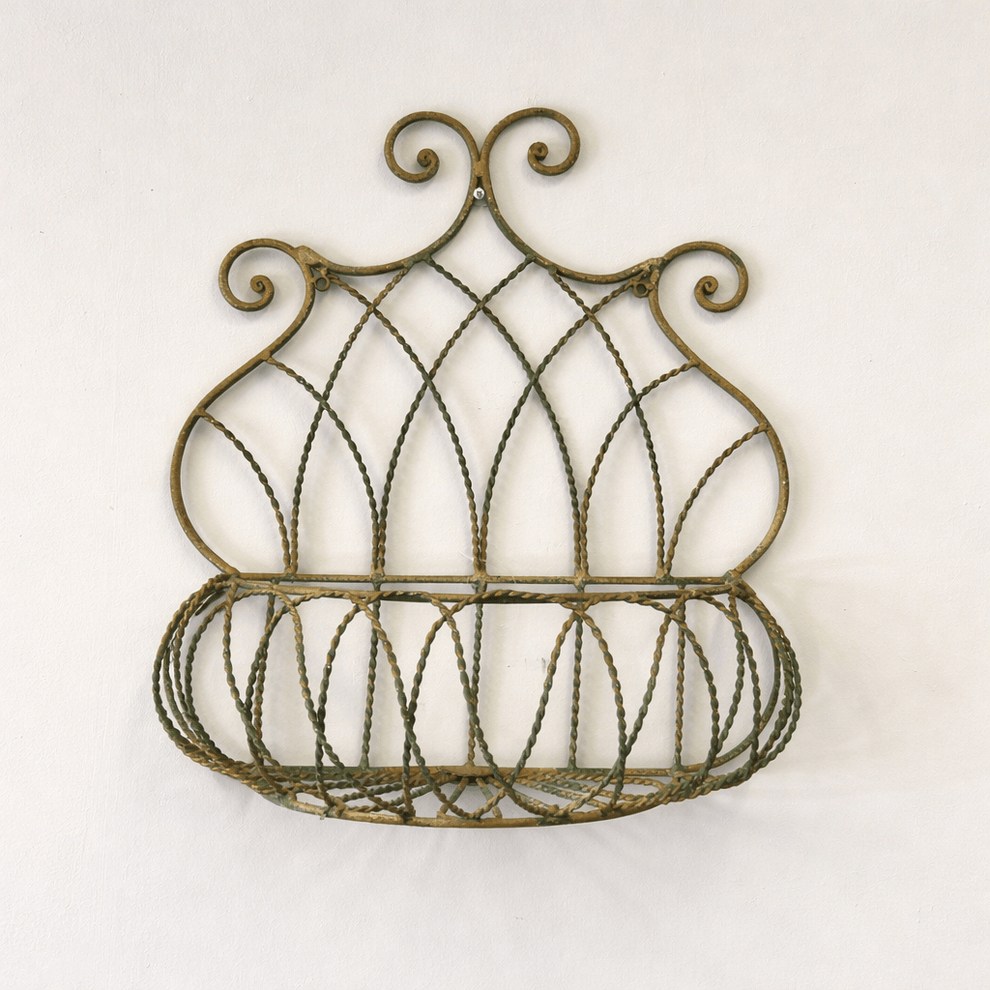 Vintage Wrought Iron Wall Basket Planter with Scrollwork Design for rustic garden style