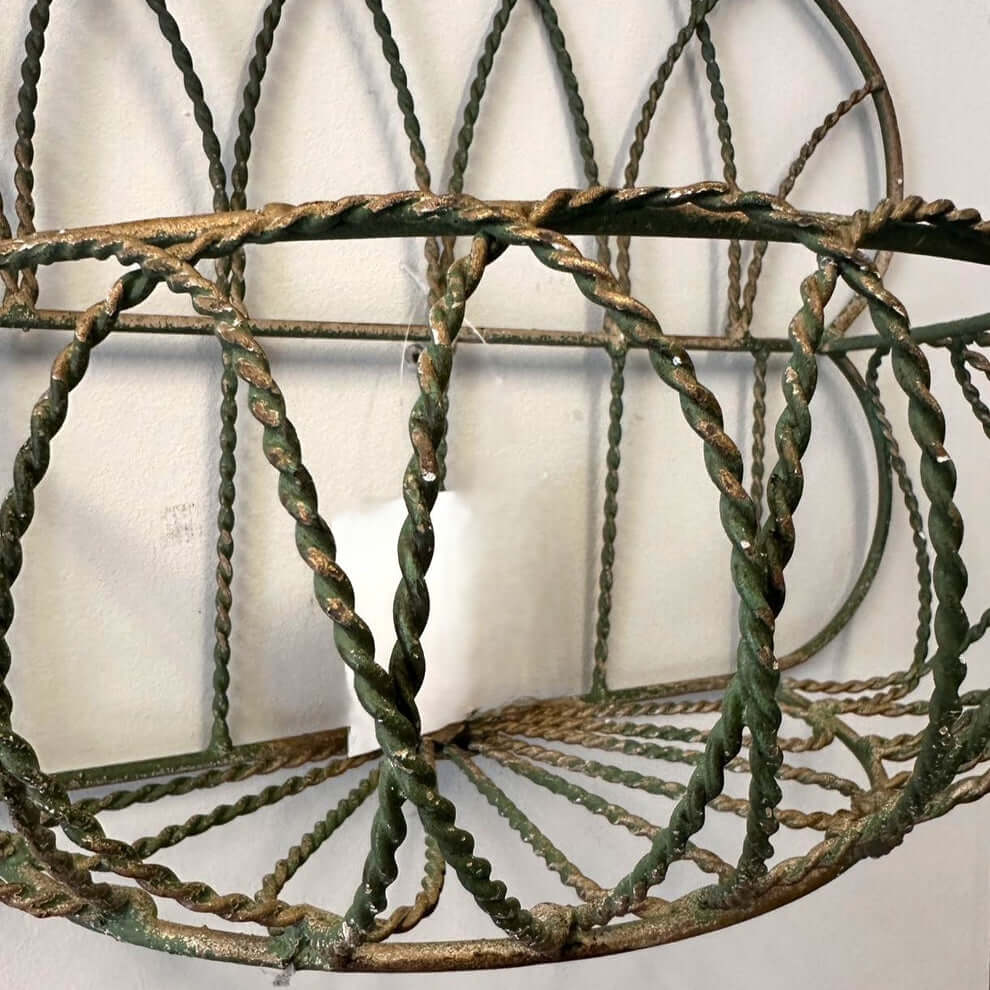 Vintage Wrought Iron Wall Basket Planter with Scrollwork Design featuring rustic detailing and timeless craftsmanship